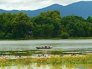 Boat on the Lak Lake Photograph by Robert Bociaga