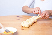 Braiding dough plait Photograph by Kerkla