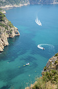 Seawater and motor boats. Cala de la Granadella Photograph by Adriana Mueller