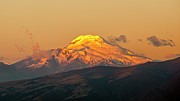 Cayambe volcano under a burning sunset Photograph by Henri Leduc