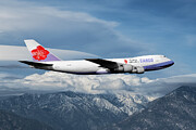 China Airlines Cargo Boeing 747-200F over Snowcapped Mountains Mixed Media by Erik Simonsen