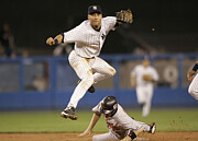Chris Gomez and Derek Jeter Photograph by Mike Ehrmann