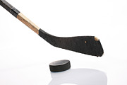 Close up of hockey stick and puck on white background Photograph by Walik
