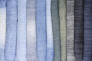 Close up of the stack of various jeans Photograph by Severija Kirilovaite