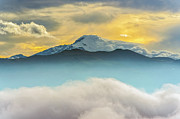Cloud bank and sunrise on the Cayambe volcano Photograph by Henri Leduc Cloud bank and sunrise on the Cayambe volcano Photograph by Henri Leduc