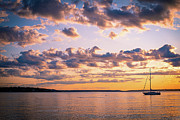 Clouds and a Sunset Photograph by Vera Chwostyk