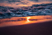 Cool frothy waves mix cool blues with sun rise orange Photograph by Sven Brogren