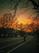 Cycling at Sunset Photograph by Leslie Brashear