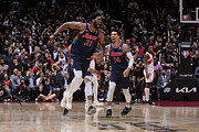 Danny Green and Joel Embiid Photograph by Mark Blinch