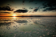 Dramatic winter sunset in the lake.  Photograph by Michalakis Ppalis