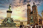 European monuments opposite St. Mary's Basilica gothic church against dramatic sunset located in Krakow city, Poland, Europe Photograph by Arpan Bhatia
