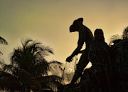 Fisherman at dusk on Isla De Mujeres, Mexico Photograph by Tatiana Travelways