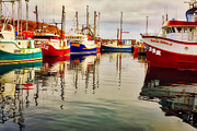 Fishing boats water reflections Newfoundland Photograph by Tatiana Travelways