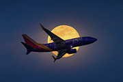 Flight Over the Moon Photograph by Mark Andrew Thomas Flight Over the Moon Photograph by Mark Andrew Thomas