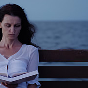 Girl with book on a bench  Digital Art by Natarajan S