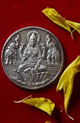 Goddess Lakshmi, Silver Coin against red background-Diwali/Deepavali Photograph by Veena Nair