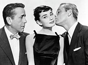 HUMPHREY BOGART, WILLIAM HOLDEN and AUDREY HEPBURN in SABRINA -1954-, directed by BILLY WILDER. Photograph by Album