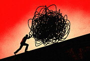 Illustration of a silhouette of a person pushing a large, tangled ball up a steep incline Photograph by Rob Dobi