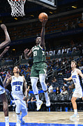 Jrue Holiday Photograph by Gary Bassing