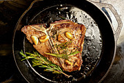 Juicy T-bone Beef Steak in a Cast Iron Skillet Photograph by Grandriver