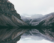 Moody Bow Lake Reflections Photograph by Dan Sproul