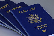Multiple United States of America passports Photograph by Douglas Sacha