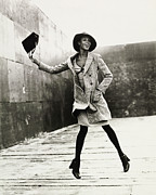 Naomi Campbell Jumping in the Air Photograph by Arthur Elgort