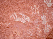 Petroglyphs on a Red Wall in Canyon de Chelly National Monument Photograph by L Bosco