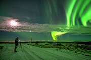 Photographer under northern skies Photograph by Dubi Roman