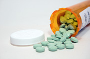 Pills Spilled From a Prescription Bottle Photograph by Wwing