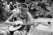 Playing the 8-String Photograph by Regina Muscarella Playing the 8-String Photograph by Regina Muscarella