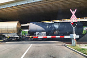 Railroad crossing with tank cars Photograph by Peter Zelei Images