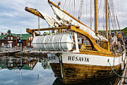 Reflection in the harbor of Husavik, Iceland Photograph by Lyl Dil Creations