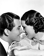 ROBERT TAYLOR and ELEANOR POWELL in BROADWAY MELODY OF 1936 -1935-. Photograph by Album
