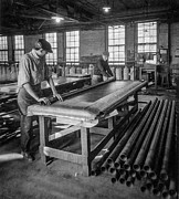 Rolling an Inner Tube Photograph by Unknown Rolling an Inner Tube Photograph by Unknown