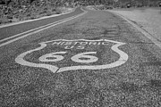 Route 66 black and white Photograph by Darrell Foster