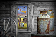 Rustic milk cans on a weathered wooden table by an old wagon wheel with a window and water pump Photograph by Randall Nyhof Rustic milk cans on a weathered wooden table by an old wagon wheel with a window and water pump Photograph by Randall Nyhof