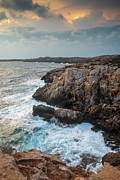 Seascape with windy waves during stormy weather at sunset. Photograph by Michalakis Ppalis