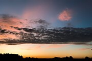 Silhouettes of Dawn A Serene Sunrise or Sunset Photograph by Travel Essayist