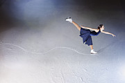 Skater making edge in ice, showing path. Photograph by Robert Decelis Ltd
