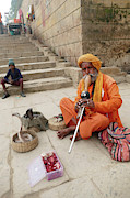 Snake charmer with his snakes Photograph by Steve Estvanik