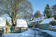 Snow and Winter Sunlight Across Snowshill Village Photograph by Tim Gainey