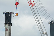 SpaceX booster and crane with crew basket. Photograph by Bradford Martin