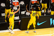 Stephen Curry and Lebron James Photograph by Scott Cunningham