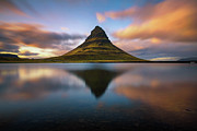 Sunset over Kirkjufell mountain with reflection in a nearby lake in Iceland Photograph by Miroslav Liska