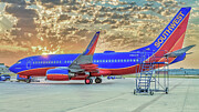 The Winning Spirit 737 and Stunning Sunrise Photograph by Robert Bellomy