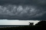 Thunderstorm over Palm Beach Lifeguard Tower Photograph by Greg Lovett