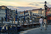 Venice, Italy A couple walking holding hands against rialto bridge, a famous place known as one of the romantic destination Photograph by Arpan Bhatia Venice, Italy A couple walking holding hands against rialto bridge, a famous place known as one of the romantic destination Photograph by Arpan Bhatia