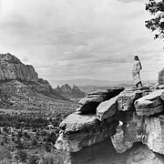 Veruschka on a Barren Cliff in the Arizona Desert Photograph by Franco Rubartelli