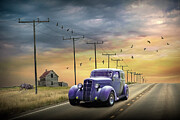 Vintage car on an open country road with birds flying overhead against a dramatic sky Photograph by Randall Nyhof Vintage car on an open country road with birds flying overhead against a dramatic sky Photograph by Randall Nyhof